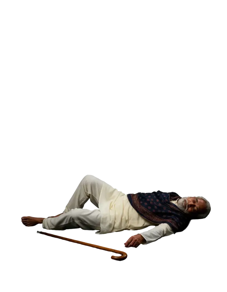 Older man lying on the floor after a fall